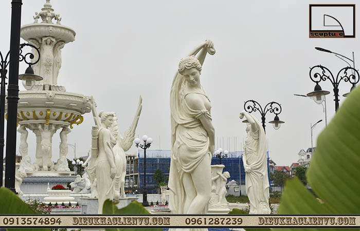 Tượng cô gái đổ nước composite